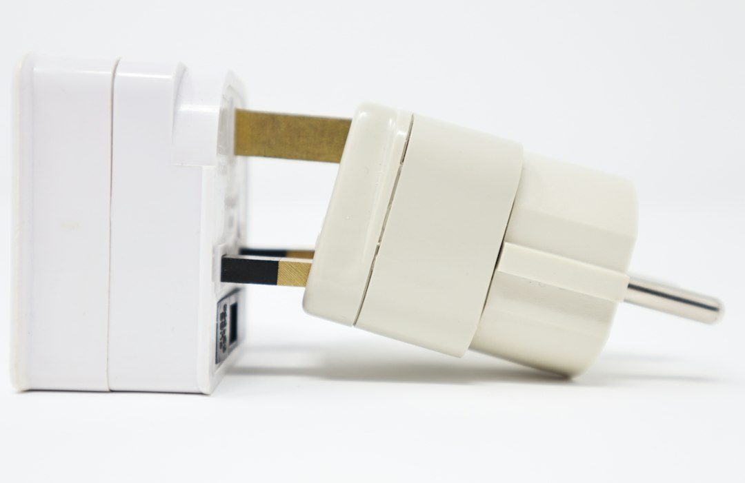 UK and European electrical plugs side by side